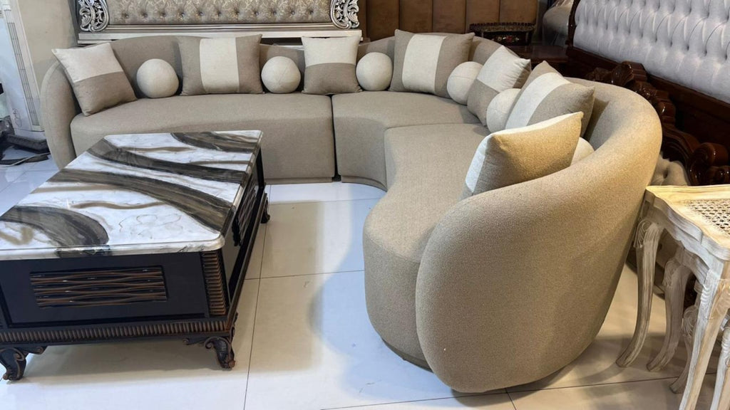 Curved L-shape 7-seater sofa with Molty Foam seating and spring support - angle view