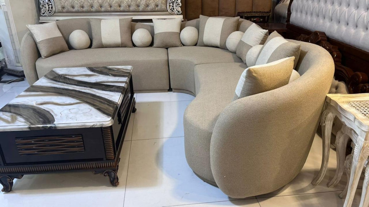 Curved L-shape 7-seater sofa with Molty Foam seating and spring support - angle view